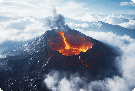 An active volcano erupting with lava surrounded by clouds and mountains in a dramatic landscape.